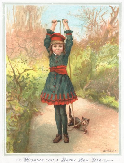 Niña jugando con cuerda de saltar y gato de English School