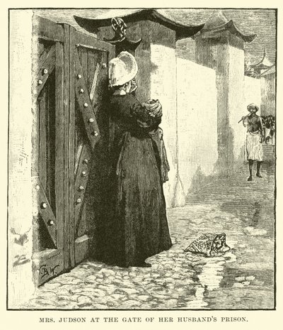 La Sra. Judson en la puerta de la prisión de su esposo de English School