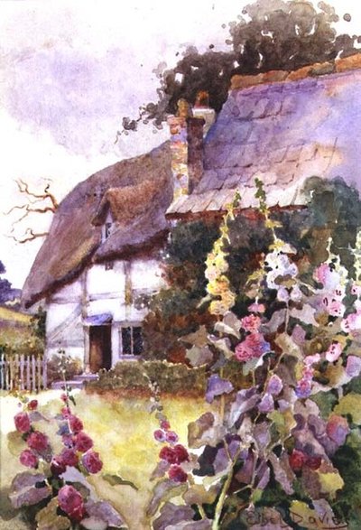 Malvarrosas fuera de una cabaña con techo de paja de Ethel Davies