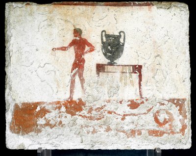 Arte etrusco: un joven efebo desnudo cerca de una mesa donde se coloca un jarrón. Fresco de la tumba del “buceador”. Del cementerio sur de Paestum. 480-470 a.C. Museo Arqueológico Nacional, Paestum de Etruscan
