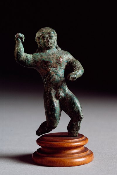 Arte etrusco: estatuilla de atleta de bronce de la Fuente Veneziana. 520-500 a.C. Dim. 6 cm Florencia, Museo Arqueológico de Etruscan