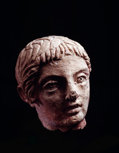 Civilización etrusca: cabeza de un joven del templo de Belvedere, en Orvieto - siglo V-IV a.C. Diámetro 13 cm de Etruscan
