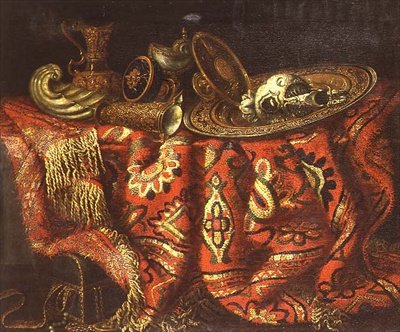 Una copa de nautilus, una patena, jarras y un plato dorado sobre una alfombra de Francesco (circle of) Fieravino
