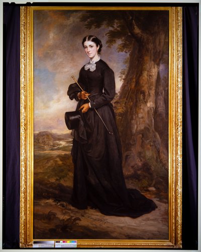 Retrato de una dama con hábito de amazona negra, de pie en un paisaje de Francis Grant