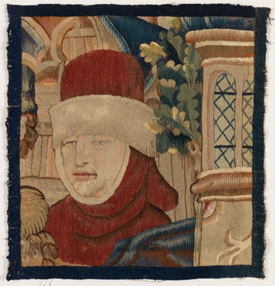 Pequeño fragmento de tapiz que representa la cabeza de un hombre, finales del siglo XV (lana) de Franco-Flemish School