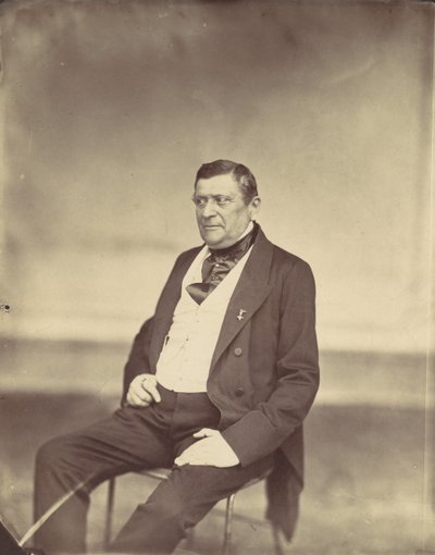 Hombre sentado con chaleco blanco y abrigo oscuro de Franz Antoine