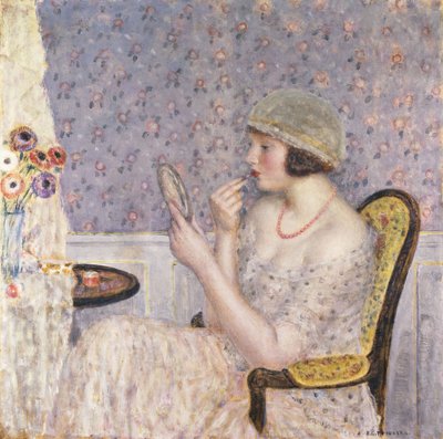 Mujer en un tocador de Frederick Carl Frieseke