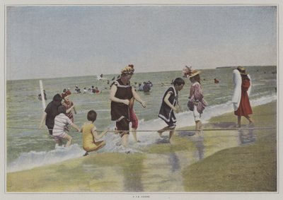 Niños jugando con una cuerda en la playa (foto en color) de French Photographer
