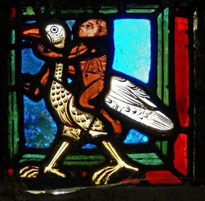 Pieza de esquina de una ventana que representa la parábola del Buen Samaritano: hombre y pájaro de French School