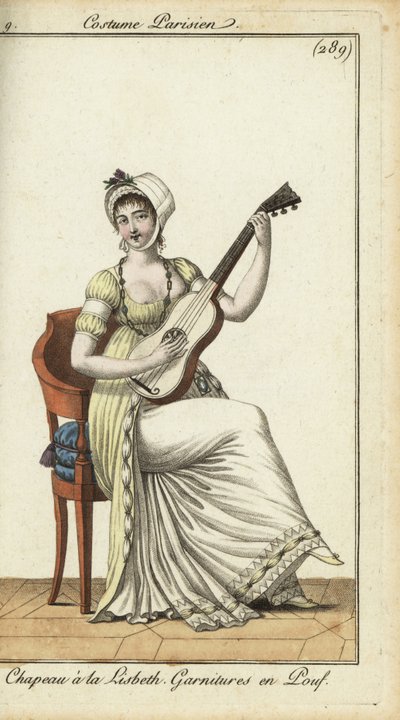 Mujer a la moda tocando la guitarra de French School