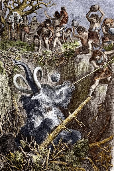 Paleolítico: escena de caza de un mamut, una tribu de hombres prehistóricos lanzan piedras a un mamut cae en un pozo (paleolítico: hombres de las cavernas europeas cazando un mamut cayó en un pozo) Grabado del siglo XIX Colección particular de French School
