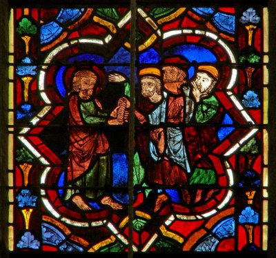Escena en la ventana E que representa a Judas recibiendo las monedas de plata de French School