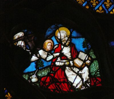 La ventana rosa oeste representando una escena del Libro de Apocalipsis: Apertura del primer sello, con el ángel de Mateo (6:1) de French School