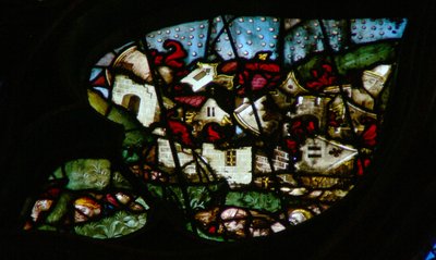La ventana rosa oeste que representa una escena del Libro de Apocalipsis: gran terremoto y granizo tan pesado como monedas (16:18-21) de French School