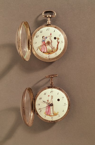 Dos relojes de bolsillo con símbolos revolucionarios (metal y esmalte) de French School