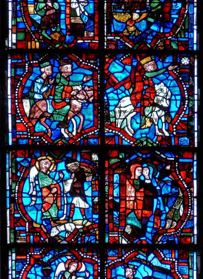 Ventana que representa escenas de la infancia de Cristo, incluyendo a los Magos siguiendo la estrella, la Anunciación a los Pastores y la Visitación de French School
