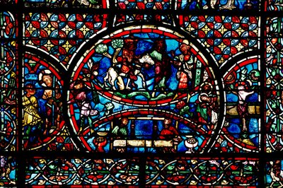 Ventana que representa al Buen Samaritano y el Gremio de Tejedores de French School