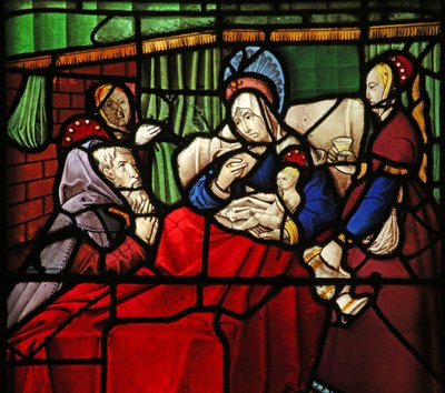 Ventana w17 que representa la Vida de San Remigio. El santo ermitaño Montan es milagrosamente curado por la leche aplicada por el santo a sus ojos de French School