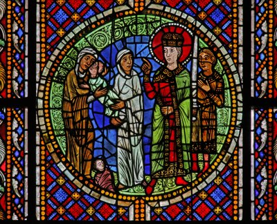 Ventana w3 que representa a Salomón otorgando el niño a la verdadera madre de French School