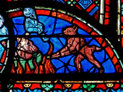 Ventana w4 que representa a un impenitente siendo atormentado por demonios de French School