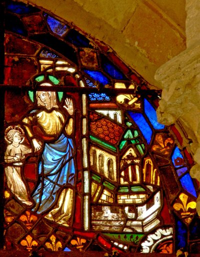 Ventana w6 que representa a María con el niño Jesús llevándolo al templo de French School