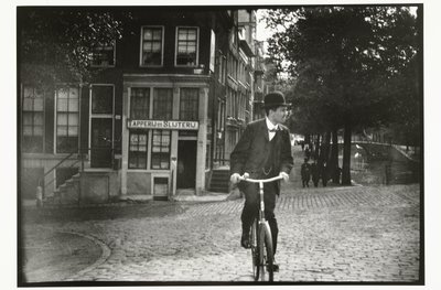 Ciclista en Keizersgracht en Amsterdam de George Hendrik Breitner