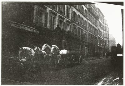 Vista de la calle con caballos y carruajes en París de George Hendrik Breitner