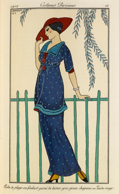 Bata de playa en foulard garni de tussor gros grain chapeau en Suède rouge. Costumes Parisiens nº 15. Mujer con vestido de playa y pañuelo de seda cruda ribeteado de grosgrain en azul moteado y sombrero rojo. de Georges Barbier
