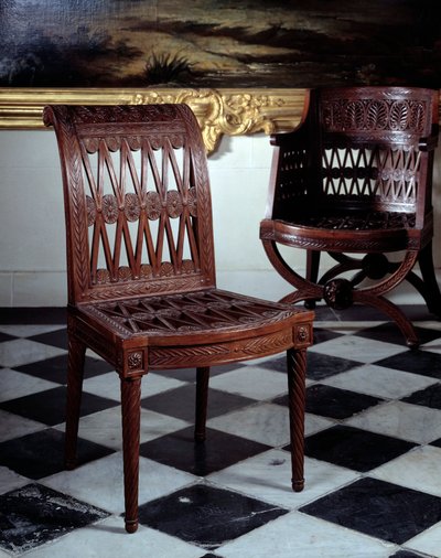 Silla encargada para la lechería de María Antonieta. Mueble de caoba tallada por Georges Jacob de Georges Jacob