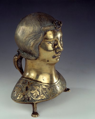 Aquamanile (cuenco para lavar las manos del sacerdote durante la misa) en bronce dorado en forma de busto de joven. 1300-1325. De Hildesheim. París, museo nacional de la Edad Media, Termas de Cluny de German School