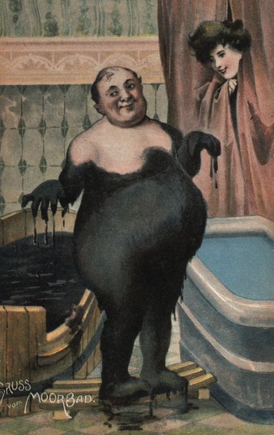Hombre tomando un baño de barro de German School