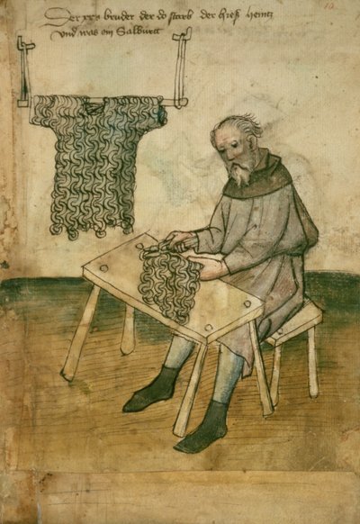 Armero haciendo una cota de malla de German School