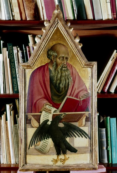 San Juan Evangelista mostrado con su símbolo, un águila de Giovanni di Paolo
