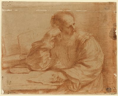 Hombre barbudo sentado en la mesa de Guercino