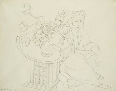 Mujer sentada con jarrón de tulipanes de Henri Matisse