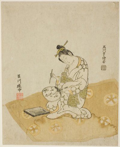 Escribiendo en un abanico de Ishikawa Toyonobu