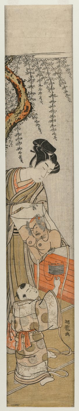 Joven y niño con una cometa de Isoda Koryusai