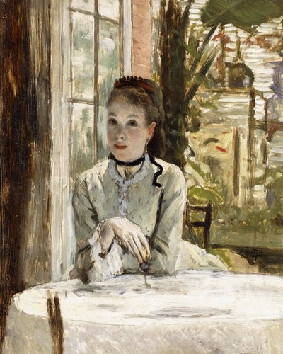 Una mujer en un interior elegante de James Jacques Joseph Tissot