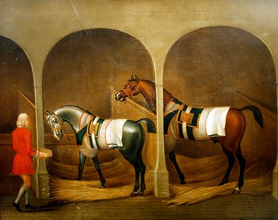 Un mozo de cuadra alimentando dos caballos en un establo de James Seymour