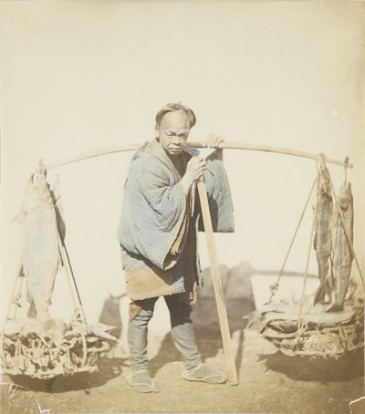 Pescador con su captura de Japanese Photographer