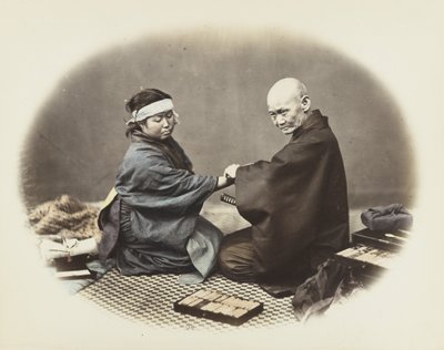Hombre y mujer japoneses con vestido tradicional de Japanese Photographer