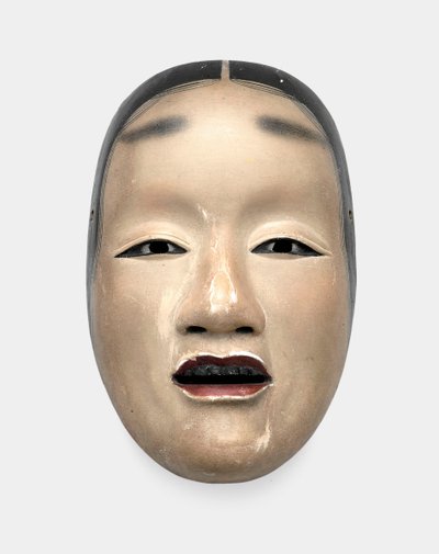 Una Máscara de Madera con Base de Gofun, Pintada con Sumi para el Cabello, Ojos y Dientes y Rojo para los Labios de Japanese School
