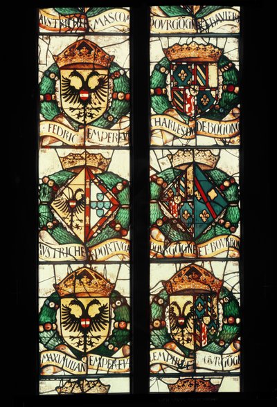 Escudos heráldicos de las familias reales de Austria, Alemania, Francia y Portugal asociados con la donante, Margarita de Austria de Jean Orquois Antoine Noisin