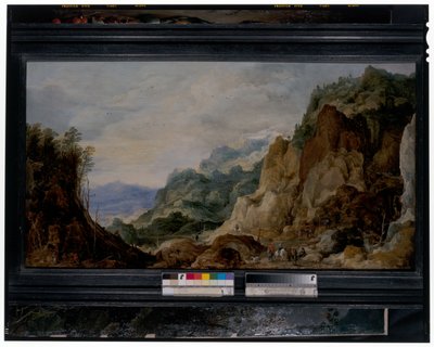 Un paisaje montañoso panorámico con jornaleros dando a los pobres, caballos de carga más allá de Joos or Josse de The Younger Momper