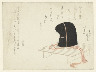 Una gorra de corte en un soporte de Katsushika Hokusai