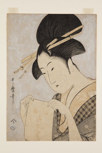 Belleza con una toalla de mano (grabado en madera a color) de Kitagawa Utamaro