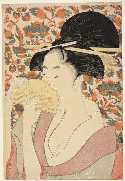Mujer sosteniendo un peine de concha de tortuga de Kitagawa Utamaro