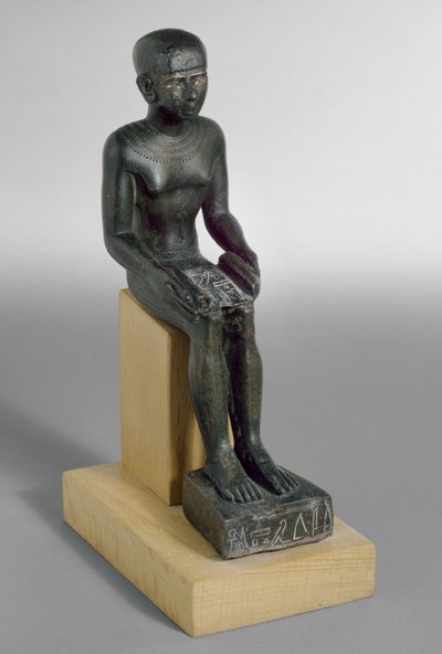 Estatuilla del dios Imhotep, los ojos incrustados con cobre y oro de Late Period Egyptian