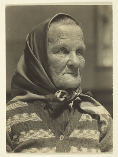 Abuela checa, Ellis Island de Lewis Wickes Hine