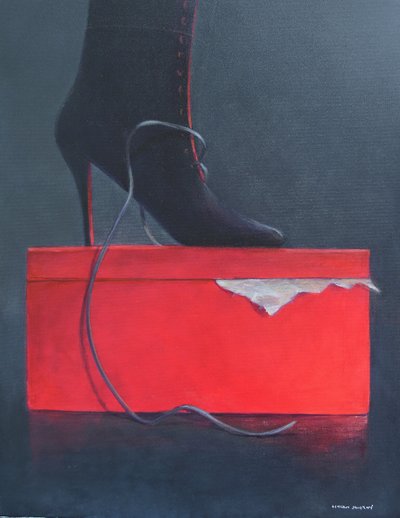 Bota en una caja roja de Lincoln Seligman